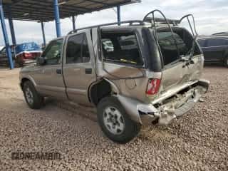 2003 Chevrolet Blazer LS z VIN 1GNDT13X73K112544, wystawiony jako Copart lot #83819714 z przebiegiem 96 738 mil mil oraz Szkoda całkowita • Salvage title. Historia ofert i sprzedaży dostępna na DreamBid. Obrazek 2.