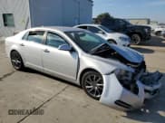 ✅ 2012 Chevrolet Malibu 2LT • VIN: 1G1ZD5E04CF140399 • Lot: 83236864. Listed on Copart with 123,410 mi. Free auction sales archive from the USA and detailed vehicle history report at DreamBid. Image 4.