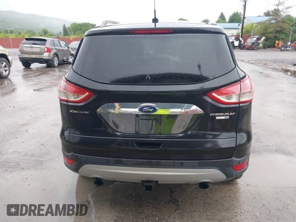 ✅ 2015 Ford Escape Titanium • VIN: 1FMCU9J95FUA75924 • Lot: 42329222. Listed on IAAI with 123,817 mi. Free auction sales archive from the USA and detailed vehicle history report at DreamBid. Image 16.