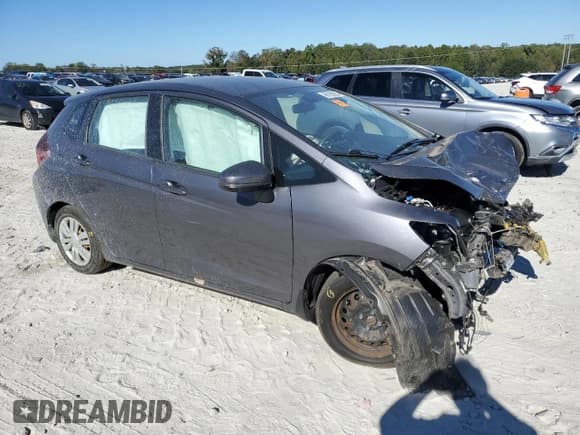 ✅ 2015 Honda Fit LX • VIN: 3HGGK5H59FM744418 • Lot: 86169295. Listed on Copart with 108,686 mi. Free auction sales archive from the USA and detailed vehicle history report at DreamBid. Image 4.