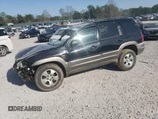 ✅ 2003 Mazda Tribute LX • VIN: 4F2YZ94143KM11300 • Lot: 52115535. Wystawiony na Copart z przebiegiem 236 842 mil. Bezpłatny archiwum sprzedaży aukcyjnych z USA i szczegółowy raport historii pojazdu na DreamBid. Zdjęcie 1.