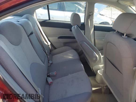 2006 Hyundai Accent GL z VIN KMHCN45C26U052459, wystawiony jako Copart lot #84417075 z przebiegiem 247 312 mil mil oraz Szkoda całkowita • Salvage title. Historia ofert i sprzedaży dostępna na DreamBid. Obrazek 10.