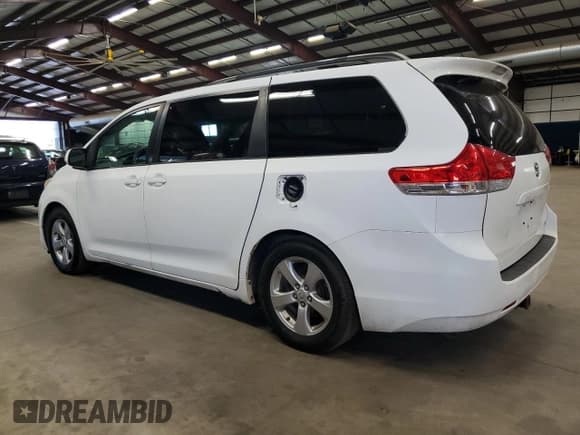 ✅ 2012 Toyota Sienna LE AAS • VIN: 5TDKK3DC8CS183318 • Lot: 81241035. Listed on Copart with 275,863 mi. Free auction sales archive from the USA and detailed vehicle history report at DreamBid. Image 2.