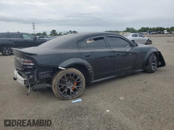 ✅ 2022 Dodge Charger SRT Hellcat Widebody • VIN: 2C3CDXL97NH163644 • Лот: 62159065. Опубликован ранее на Copart с пробегом 21 814 миль. Бесплатный доступ к архиву аукционных продаж из США и подробный отчёт об истории автомобиля на DreamBid. Изображение 3.