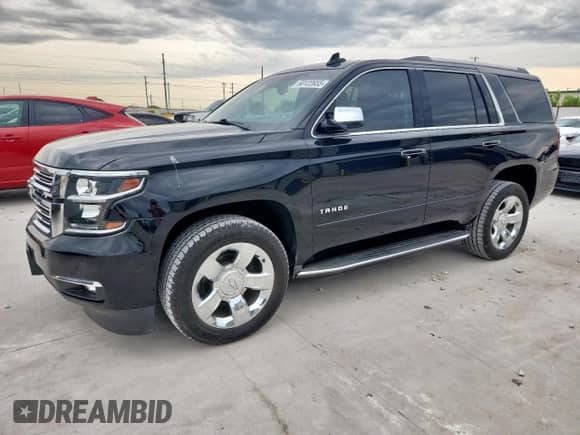 2020 Chevrolet Tahoe Premier z VIN 1GNSCCKC8LR188993, wystawiony jako Copart lot #60122655 z przebiegiem 103 415 mil mil oraz Czysty tytuł • Clean title. Historia ofert i sprzedaży dostępna na DreamBid. Obrazek 1.