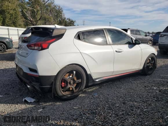 2020 Hyundai Veloster z VIN KMHT36AH2LU004930, wystawiony jako Copart lot #41761355 z przebiegiem 64 978 mil mil oraz Szkoda całkowita • Salvage title. Historia ofert i sprzedaży dostępna na DreamBid. Obrazek 3.