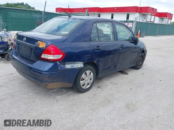 ✅ 2009 Nissan Versa 1.6 • VIN: 3N1CC11E79L429384 • Lot: 42685559. Listed on IAAI with 195,704 mi. Free auction sales archive from the USA and detailed vehicle history report at DreamBid. Image 4.