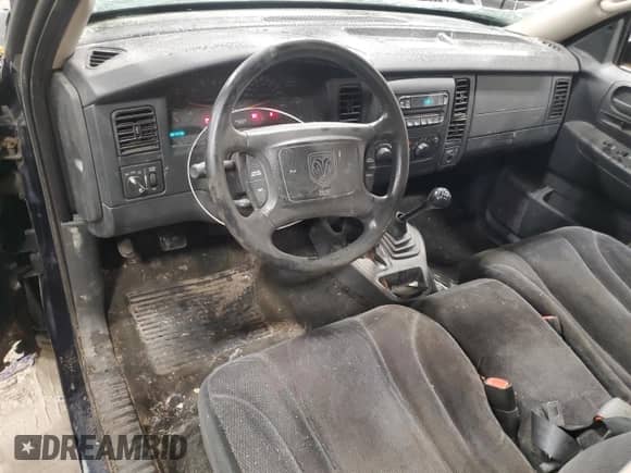 2003 Dodge Dakota Sport z VIN 1D7HG32N43S328884, wystawiony jako Copart lot #85985644 z przebiegiem 141 779 mil mil oraz Nie do naprawy • Non repairable. Historia ofert i sprzedaży dostępna na DreamBid. Obrazek 8.