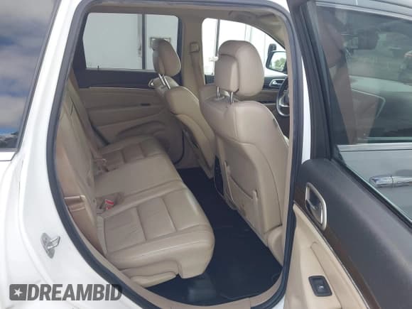 ✅ 2014 Jeep Grand Cherokee Limited • VIN: 1C4RJEBG9EC555658 • Lot: 43554748. Listed on IAAI with 167,750 mi. Free auction sales archive from the USA and detailed vehicle history report at DreamBid. Image 8.