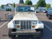 ✅ 1990 Jeep Wrangler S • VIN: 2J4FY19E5LJ525128 • Lot: 42539940. Listed on IAAI with 132,043 mi. Free auction sales archive from the USA and detailed vehicle history report at DreamBid. Image 6.