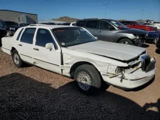 ✅ 1997 Lincoln Town Car Executive • VIN: 1LNLM81W4VY679407 • Lot: 75361054. Listed on Copart with Not provided. Free auction sales archive from the USA and detailed vehicle history report at DreamBid. Image 4.