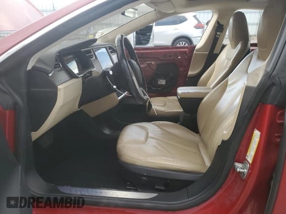 ✅ 2015 Tesla Model S 85 • VIN: 5YJSA1H11FF080167 • Lot: 80018835. Listed on Copart with 188,596 mi. Free auction sales archive from the USA and detailed vehicle history report at DreamBid. Image 7.