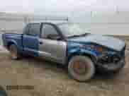 2002 Dodge Dakota Sport z VIN 1B7HL38X62S686016, wystawiony jako Copart lot #52917944 z przebiegiem 268 964 mil mil oraz Szkoda całkowita • Salvage title. Historia ofert i sprzedaży dostępna na DreamBid. Obrazek 4.
