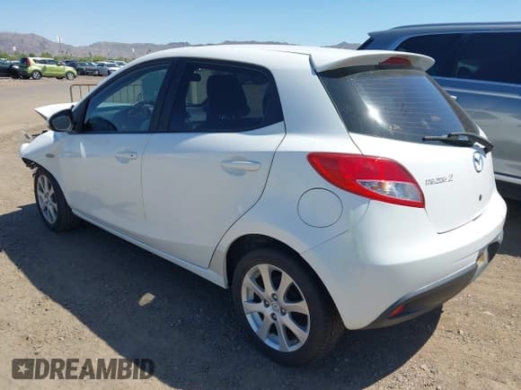 ✅ 2012 Mazda 2 Touring • VIN: JM1DE1LZ6C0152128 • Lot: 42432612. Listed on IAAI with 89,636 mi. Free auction sales archive from the USA and detailed vehicle history report at DreamBid. Image 3.