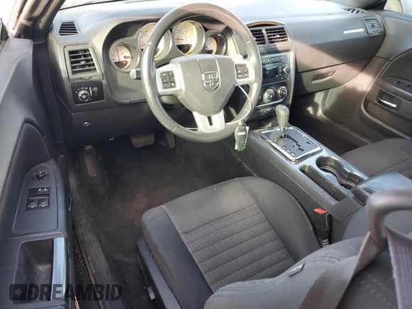 2013 Dodge Challenger SXT с VIN 2C3CDYAG2DH676337, выставлен на аукционе Copart как лот 91129205 с пробегом 173 059 миль миль и Списание • Salvage title. История ставок и продаж доступна на DreamBid. Изображение 8.