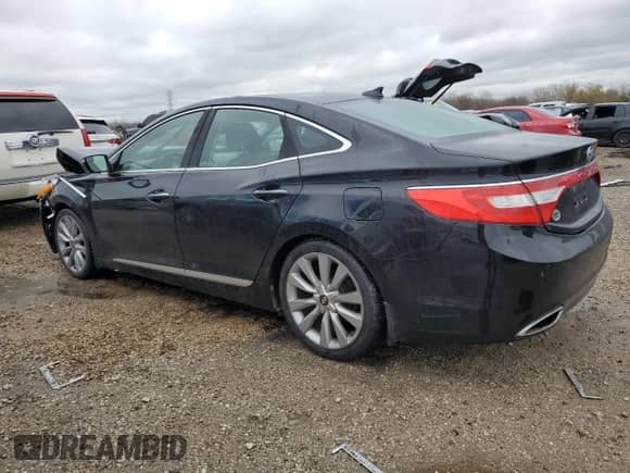 2014 Hyundai Azera Limited с VIN KMHFH4JG4EA346507, выставлен на аукционе Copart как лот 82012574 с пробегом 74 208 миль миль и Списание • Salvage title. История ставок и продаж доступна на DreamBid. Изображение 2.