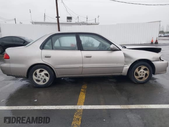✅ 2001 Toyota Corolla LE • VIN: 1NXBR12E81Z520336 • Лот: 43714749. Опубликован ранее на IAAI с пробегом 164 031 миль. Бесплатный доступ к архиву аукционных продаж из США и подробный отчёт об истории автомобиля на DreamBid. Изображение 13.