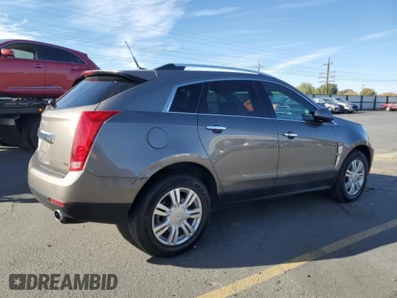 ✅ 2012 Cadillac SRX Luxury Collection • VIN: 3GYFNAE31CS517285 • Лот: 90656055. Опубликован ранее на Copart с пробегом 217 348 миль. Бесплатный доступ к архиву аукционных продаж из США и подробный отчёт об истории автомобиля на DreamBid. Изображение 3.
