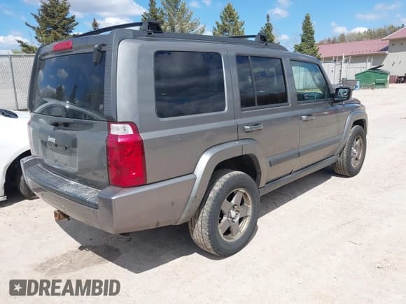 ✅ 2007 Jeep Commander Sport • VIN: 1J8HG48P87C647870 • Lot: 42185954. Listed on IAAI with 269,402 mi. Free auction sales archive from the USA and detailed vehicle history report at DreamBid. Image 4.