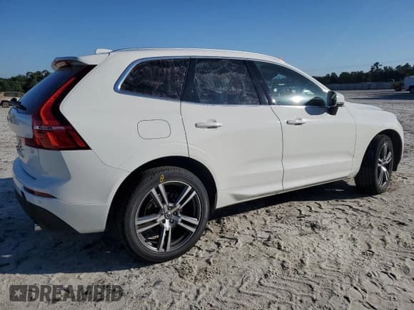 ✅ 2021 Volvo XC60 Momentum • VIN: YV4102DK4M1783395 • Lot: 70259135. Wystawiony na Copart z przebiegiem 23 061 mil. Bezpłatny archiwum sprzedaży aukcyjnych z USA i szczegółowy raport historii pojazdu na DreamBid. Zdjęcie 3.