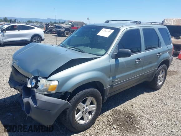 ✅ 2006 Ford Escape Hybrid • VIN: 1FMCU95H56KD11873 • Lot: 42769239. Wystawiony na IAAI z przebiegiem 241 580 mil. Bezpłatny archiwum sprzedaży aukcyjnych z USA i szczegółowy raport historii pojazdu na DreamBid. Zdjęcie 2.