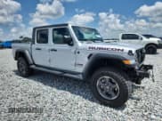 ✅ 2023 Jeep Gladiator Rubicon • VIN: 1C6JJTBG5PL585901 • Lot: 60617795. Listed on Copart with 12,702 mi. Free auction sales archive from the USA and detailed vehicle history report at DreamBid. Image 4.