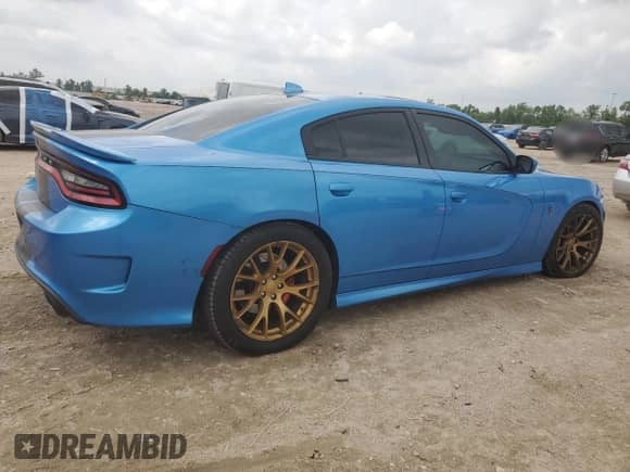 2015 Dodge Charger SRT Hellcat z VIN 2C3CDXL99FH791075, wystawiony jako Copart lot #54484085 z przebiegiem 112 704 mil mil oraz Czysty tytuł • Clean title. Historia ofert i sprzedaży dostępna na DreamBid. Obrazek 3.