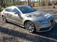 ✅ 2012 Audi A7 • VIN: WAU3GBFC8CN071019 • Lot: 43679398. Listed on IAAI with 166,451 mi. Free auction sales archive from the USA and detailed vehicle history report at DreamBid. Image 1.