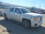 ✅ 2015 GMC Sierra 1500 Denali • VIN: 3GTU2WEJXFG344388 • Lot: 43613485. Listed on IAAI with 170,541 mi. Free auction sales archive from the USA and detailed vehicle history report at DreamBid. Image 1.