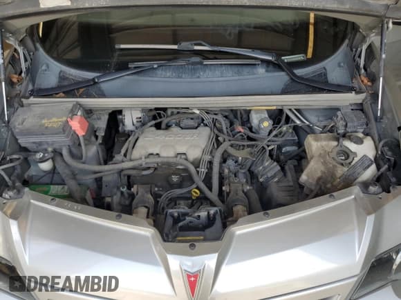 ✅ 2004 Pontiac Aztek • VIN: 3G7DB03E04S563310 • Lot: 63480025. Wystawiony na Copart z przebiegiem 104 308 mil. Bezpłatny archiwum sprzedaży aukcyjnych z USA i szczegółowy raport historii pojazdu na DreamBid. Zdjęcie 12.