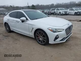 ✅ 2020 Genesis G70 3.3T • VIN: KMTG34LEXLU060919 • Lot: 41619579. Listed on IAAI with 69,859 mi. Free auction sales archive from the USA and detailed vehicle history report at DreamBid. Image 1.