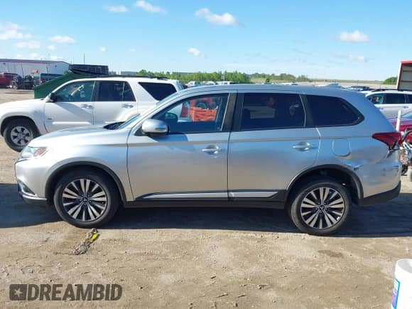 2020 Mitsubishi Outlander ES with VIN JA4AZ3A39LZ006104, listed as a IAAI auction lot 42316711 with 79,623 mi miles and . Bid and sale history available at DreamBid. Image 14.