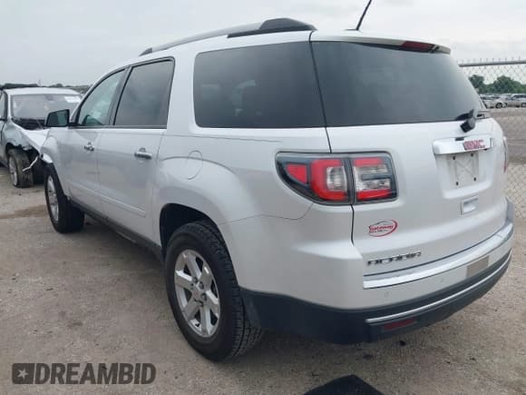 ✅ 2016 GMC Acadia SLE • VIN: 1GKKRNED2GJ115702 • Lot: 42411059. Listed on IAAI with 74,372 mi. Free auction sales archive from the USA and detailed vehicle history report at DreamBid. Image 3.