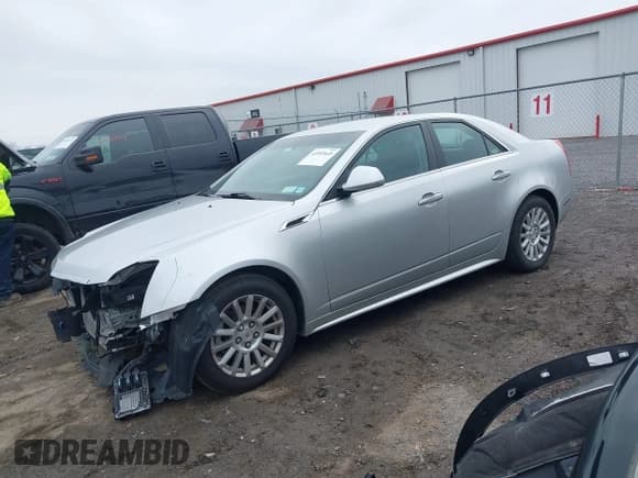 ✅ 2012 Cadillac CTS • VIN: 1G6DC5E52C0123719 • Lot: 41997649. Listed on IAAI with 79,705 mi. Free auction sales archive from the USA and detailed vehicle history report at DreamBid. Image 2.