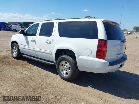 2014 Chevrolet Suburban LT z VIN 1GNSCJE0XER245963, wystawiony jako IAAI lot #43110230 z przebiegiem 160 648 mil mil oraz . Historia ofert i sprzedaży dostępna na DreamBid. Obrazek 3.