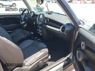 2009 MINI Hardtop S with VIN WMWMF73529TX40576, listed as a IAAI auction lot 42462085 with 77,936 mi miles and . Bid and sale history available at DreamBid. Image 5.