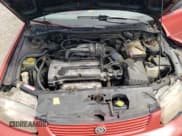 ✅ 1995 Mazda Protege • VIN: JM1BA1413S0173593 • Лот: 68877974. Опубликован ранее на Copart с пробегом 133 411 миль. Бесплатный доступ к архиву аукционных продаж из США и подробный отчёт об истории автомобиля на DreamBid. Изображение 11.