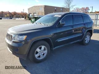 ✅ 2011 Jeep Grand Cherokee Laredo • VIN: 1J4RR4GG3BC584459 • Lot: 90755875. Listed on Copart with 97,505 mi. Free auction sales archive from the USA and detailed vehicle history report at DreamBid. Image 1.