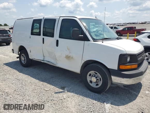 ✅ 2014 Chevrolet Express Cargo • VIN: 1GCWGFCA1E1116600 • Lot: 66352975. Listed on Copart with 123,258 mi. Free auction sales archive from the USA and detailed vehicle history report at DreamBid. Image 4.