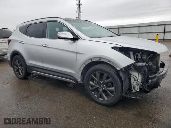 ✅ 2018 Hyundai Santa Fe Ultimate • VIN: 5XYZW4LA2JG507009 • Лот: 38081144. Опубликован ранее на Copart с пробегом 54 255 миль. Бесплатный доступ к архиву аукционных продаж из США и подробный отчёт об истории автомобиля на DreamBid. Изображение 4.