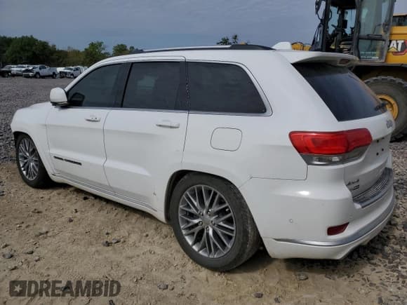 ✅ 2017 Jeep Grand Cherokee Summit • VIN: 1C4RJFJG7HC755658 • Lot: 82357815. Listed on Copart with 105,194 mi. Free auction sales archive from the USA and detailed vehicle history report at DreamBid. Image 2.