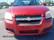 ✅ 2011 Chevrolet Aveo 1LT • VIN: KL1TD5DE0BB218359 • Lot: 41971825. Wystawiony na IAAI z przebiegiem 145 297 mil. Bezpłatny archiwum sprzedaży aukcyjnych z USA i szczegółowy raport historii pojazdu na DreamBid. Zdjęcie 6.