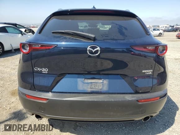 ✅ 2023 Mazda CX-30 Premium • VIN: 3MVDMBDY2PM551196 • Lot: 63128945. Listed on Copart with 28,893 mi. Free auction sales archive from the USA and detailed vehicle history report at DreamBid. Image 6.