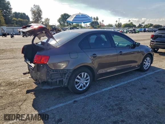 ✅ 2014 Volkswagen Jetta S • VIN: 3VW2K7AJ1EM333148 • Lot: 95349675. Listed on Copart with 124,116 mi. Free auction sales archive from the USA and detailed vehicle history report at DreamBid. Image 3.