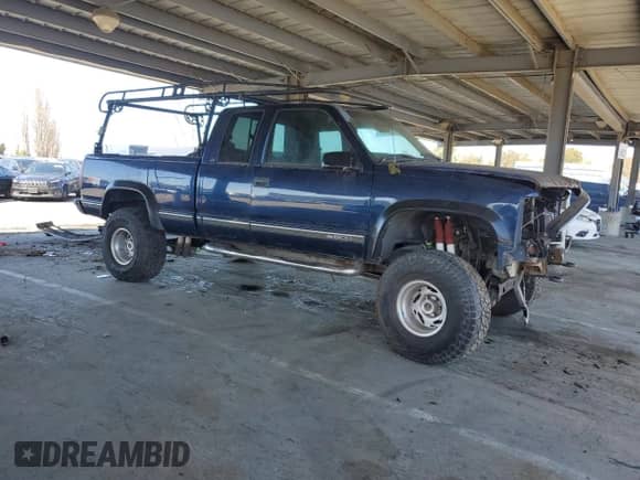 1999 Chevrolet Silverado 1500 with VIN 1GCEK19R1XR140331, listed as a Copart auction lot 45966785 with 147,140 mi miles and Clean title. Bid and sale history available at DreamBid. Image 4.