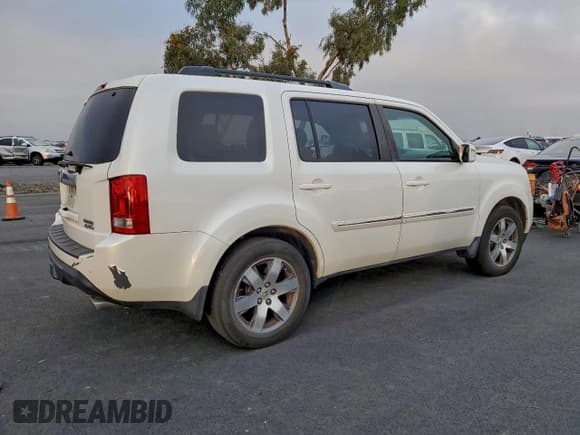 ✅ 2013 Honda Pilot Touring • VIN: 5FNYF4H95DB059001 • Lot: 96227875. Listed on Copart with 184,556 mi. Free auction sales archive from the USA and detailed vehicle history report at DreamBid. Image 3.