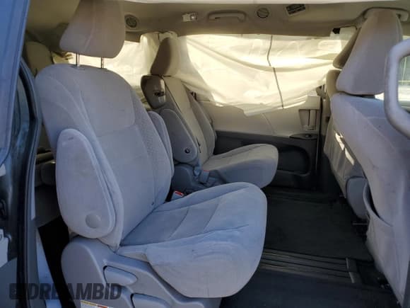 ✅ 2015 Toyota Sienna LE • VIN: 5TDKK3DC5FS567142 • Lot: 82650295. Listed on Copart with Not provided. Free auction sales archive from the USA and detailed vehicle history report at DreamBid. Image 11.