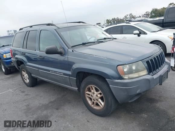 ✅ 2004 Jeep Grand Cherokee Laredo • VIN: 1J4GW48S74C223970 • Lot: 42408360. Listed on IAAI with 238,099 mi. Free auction sales archive from the USA and detailed vehicle history report at DreamBid. Image 1.