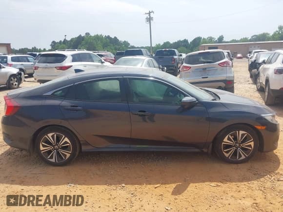 ✅ 2018 Honda Civic EX-T • VIN: 2HGFC1E38JH646332 • Лот: 42290948. Опубликован ранее на IAAI с пробегом 77 307 миль. Бесплатный доступ к архиву аукционных продаж из США и подробный отчёт об истории автомобиля на DreamBid. Изображение 13.