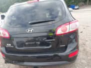 ✅ 2012 Hyundai Santa Fe GLS • VIN: 5XYZGDAG2CG144556 • Lot: 42596221. Listed on IAAI with 164,813 mi. Free auction sales archive from the USA and detailed vehicle history report at DreamBid. Image 16.